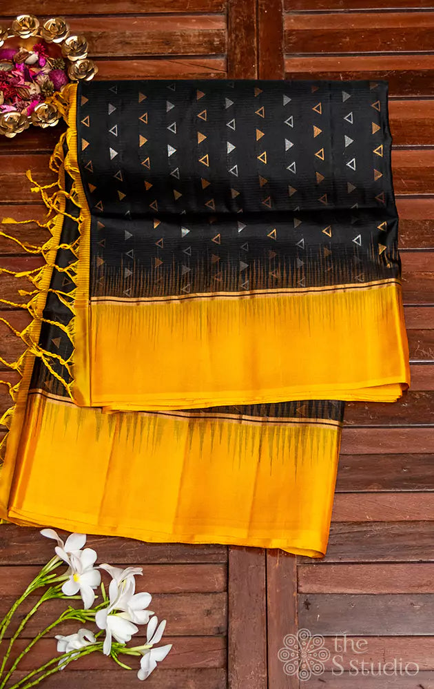 Black soft silk all over buttas saree with yellow border