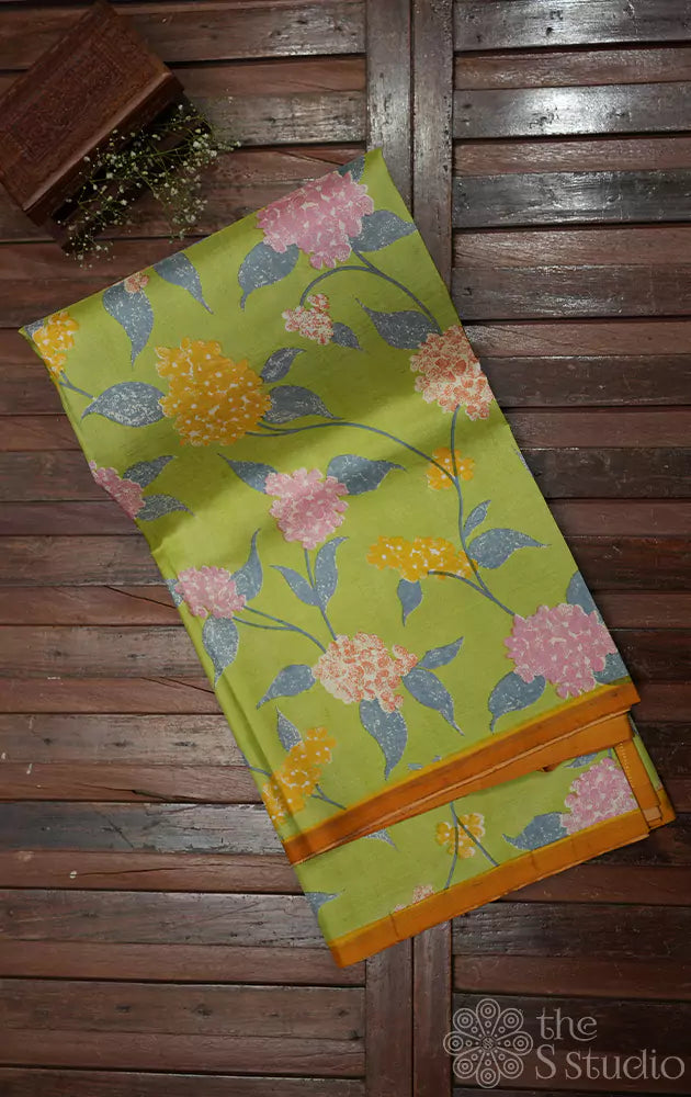 Pastel green digital printed kanchi silk saree with mustard pallu