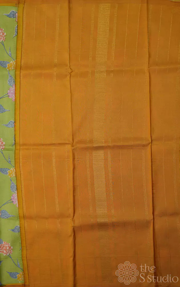 Pastel green digital printed kanchi silk saree with mustard pallu