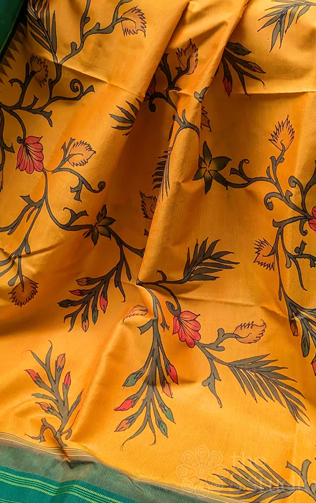 Mustard yellow kanchi pen kalamkari saree with korvai green border