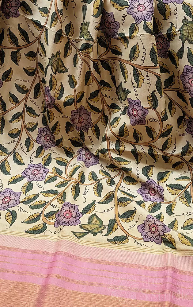 Off white floral hand painted kalamkari saree with pale pink zari border