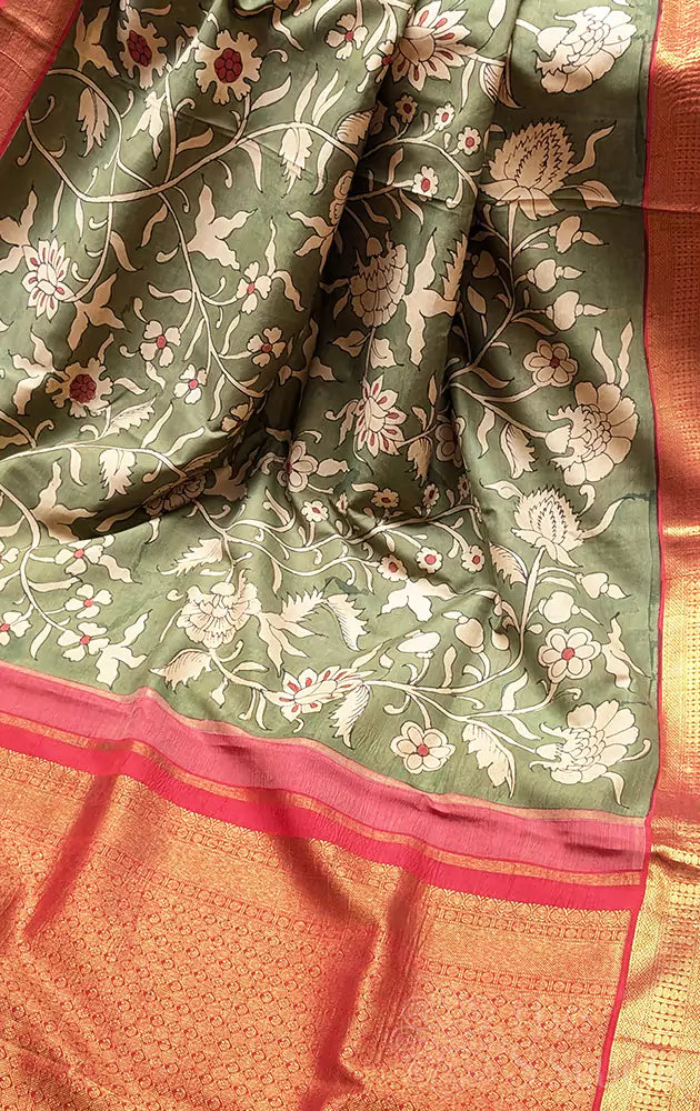 Olive green coloured kanchi hand painted kalamakari saree with korvai red border