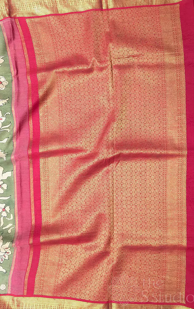 Olive green coloured kanchi hand painted kalamakari saree with korvai red border