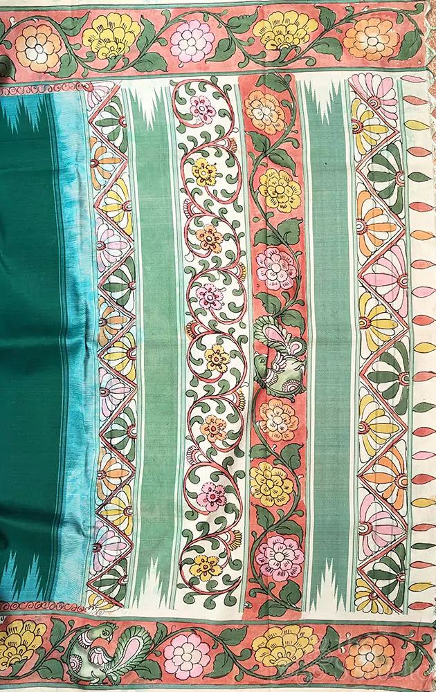 Green kanchi silk saree with hand painted kalamkari border
