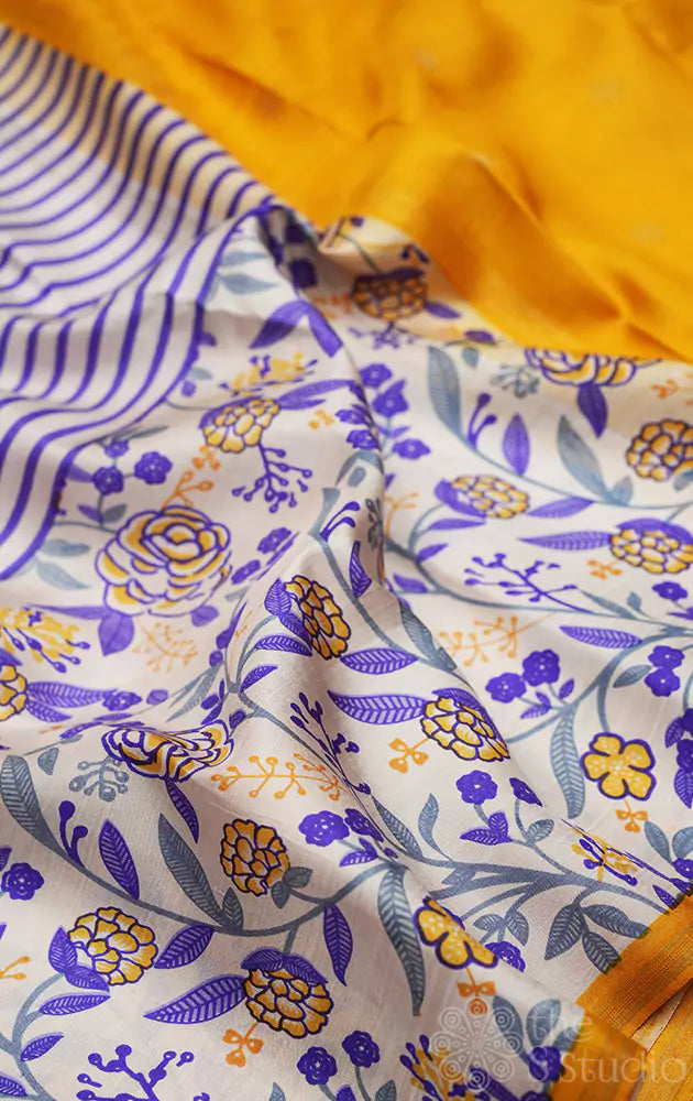 White kanjivaram silk saree with violet and yellow prints