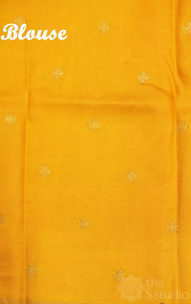 White kanjivaram silk saree with violet and yellow prints