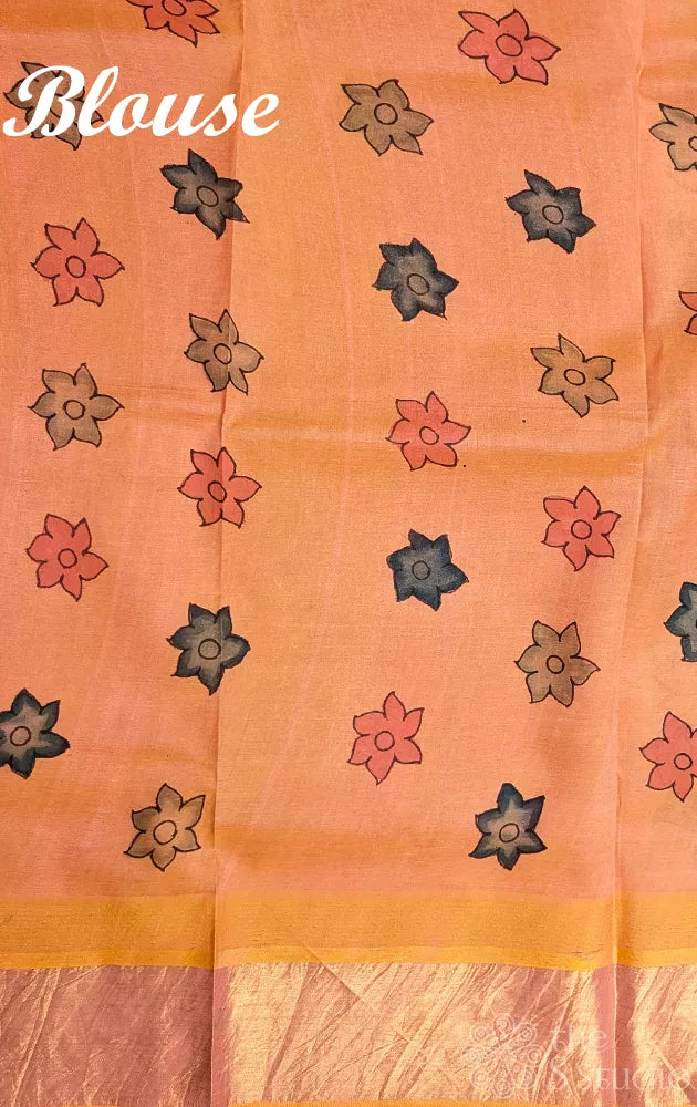 Off white handpainted kalamkari saree in silk cotton with peach border