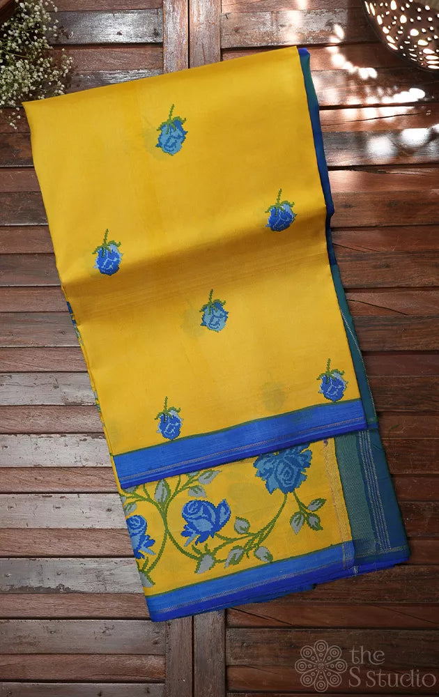 Yellow digital printed kanchipuram silk saree with peacock blue pallu