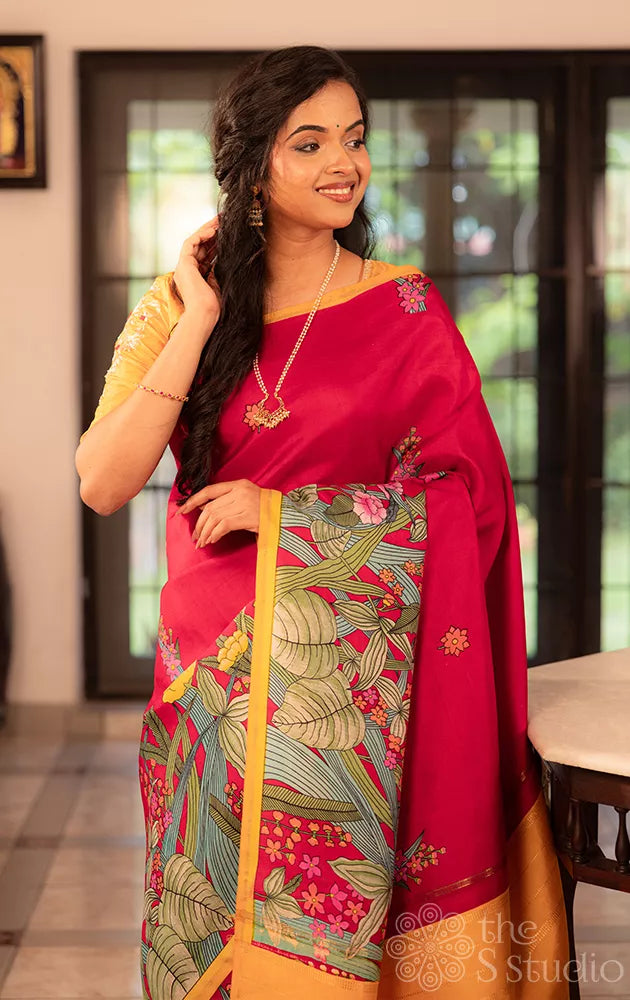 Maroon kanchi silk saree with floral prints along border