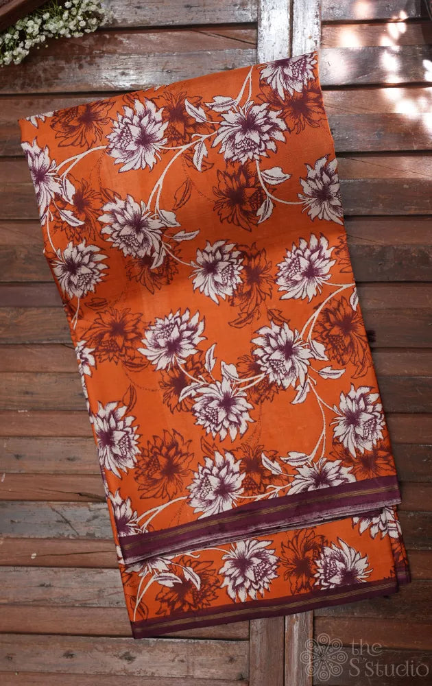 Rust kanchipuram silk saree with brown zari butta woven pallu