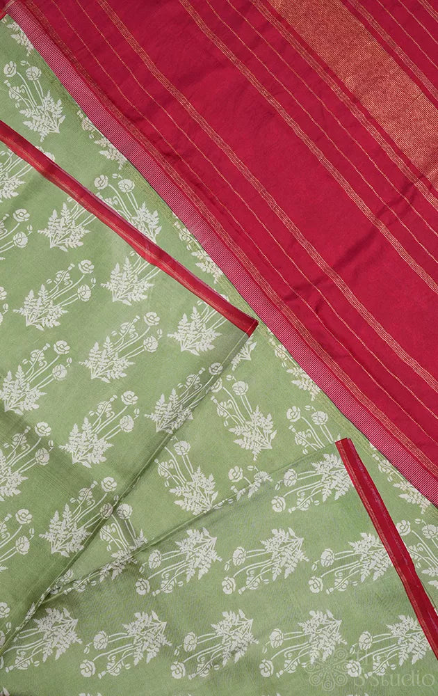 Elachi green kanchipuram silk saree with prints and a maroon pallu