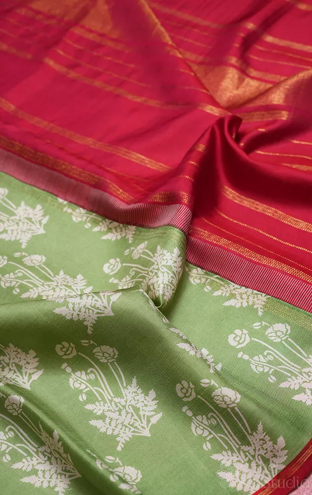 Elachi green kanchipuram silk saree with prints and a maroon pallu