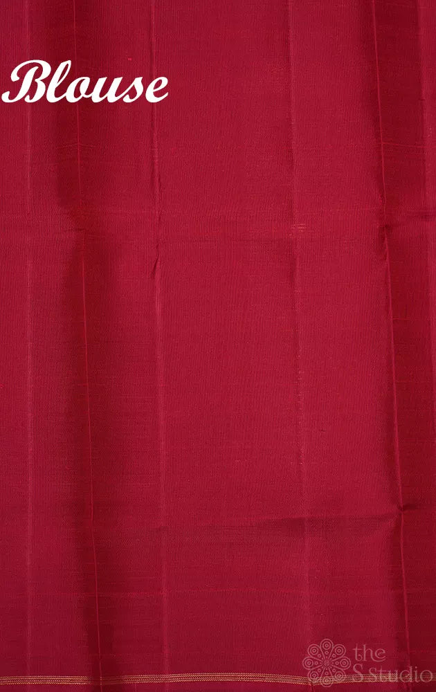 Elachi green kanchipuram silk saree with prints and a maroon pallu
