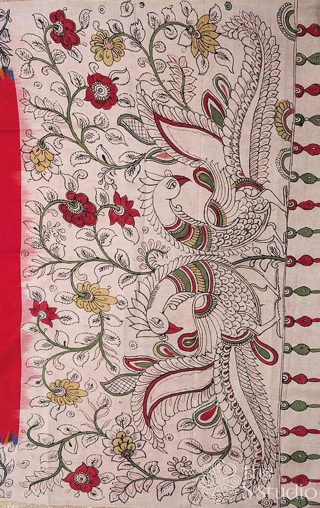 Red pochampally ikat silk saree with pen kalamkari border