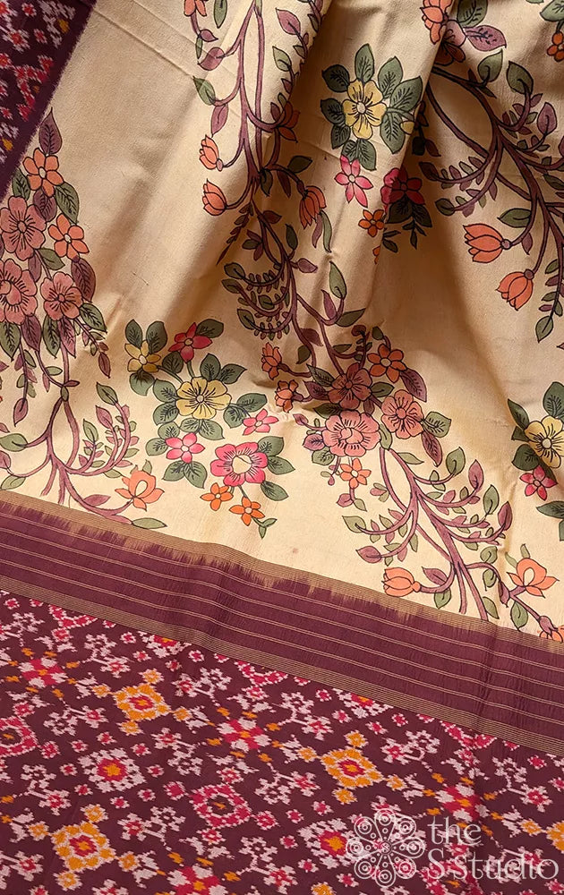 Beige hand painted kalamkari ikkat silk saree with brown ikkat border
