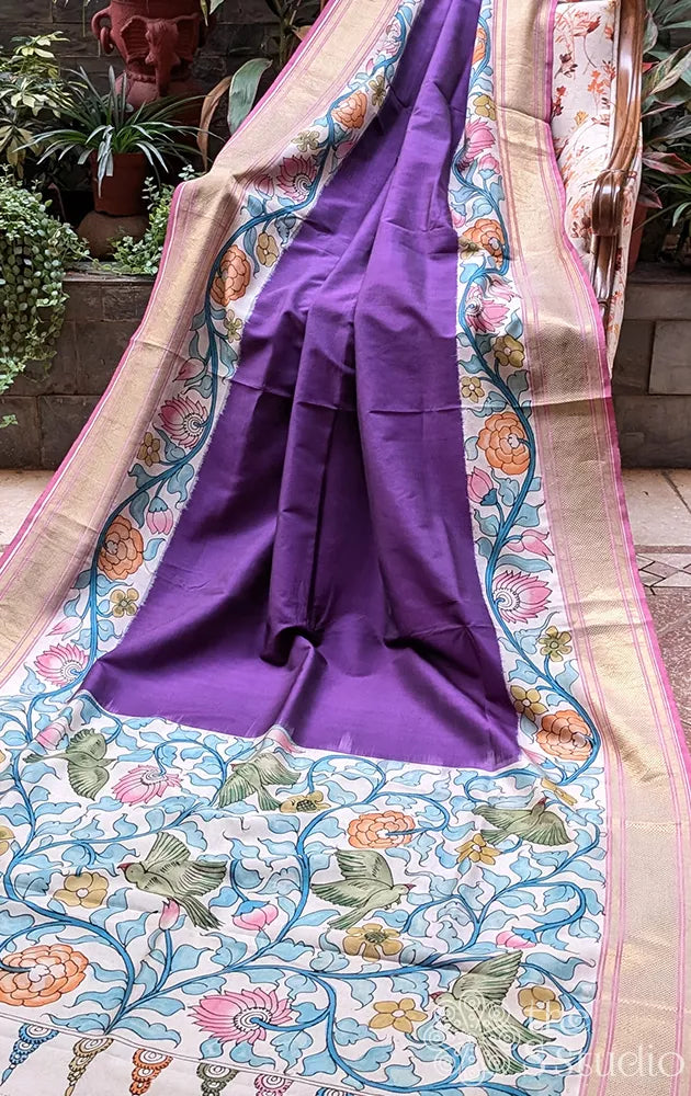 Violet ikkat silk saree with hand painted kalamkari and zari border