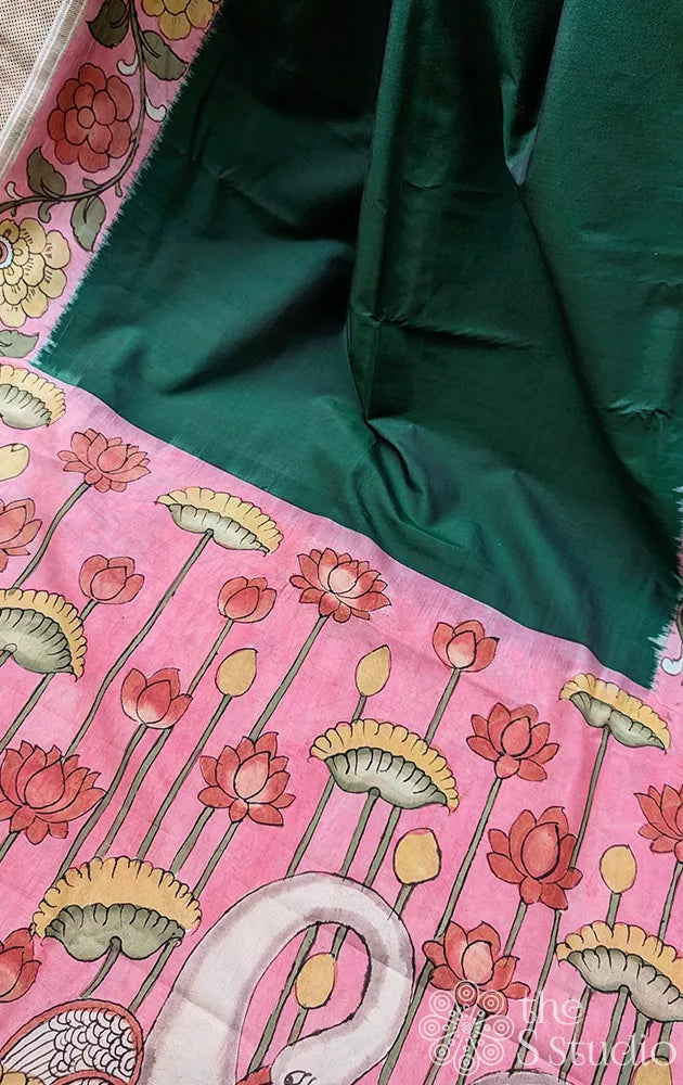 Green pochampally ikat silk saree with pink pen kalamkari border