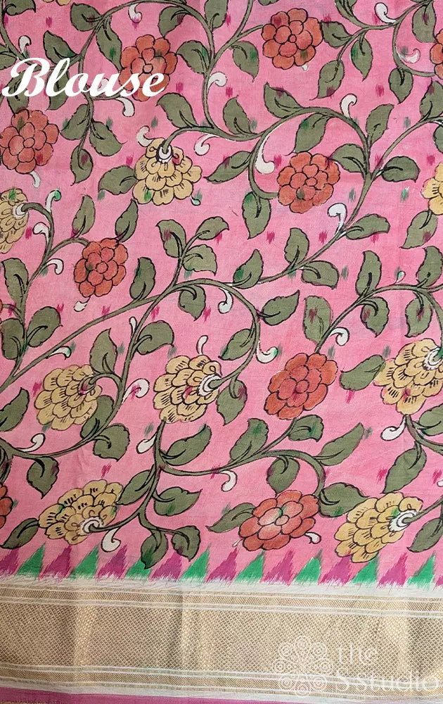 Green pochampally ikat silk saree with pink pen kalamkari border