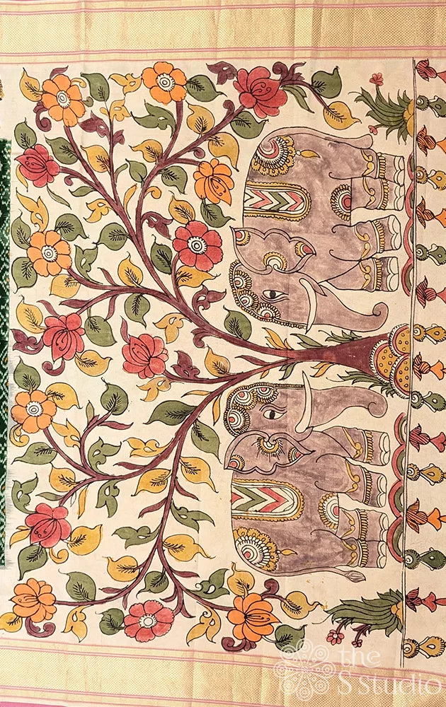 Green ikkat silk saree with hand painted kalamkari border and pallu