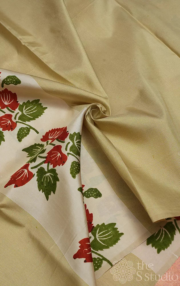 Golden beige and white kanchi silk saree with floral prints