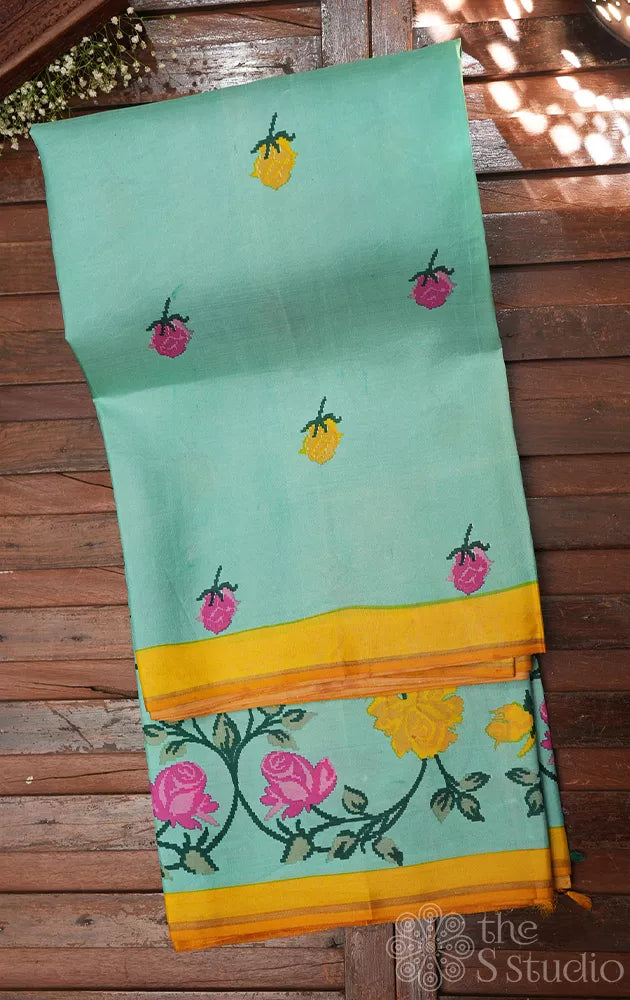 Aqua blue printed kanchi pattu saree with yellow pallu