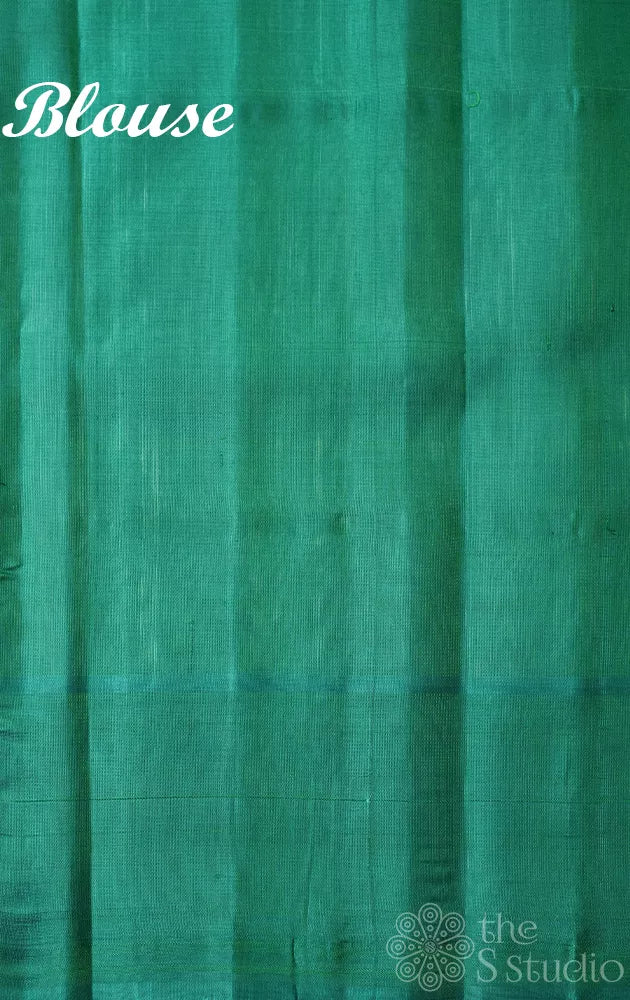 Off white gadwal silk saree with teal green temple border