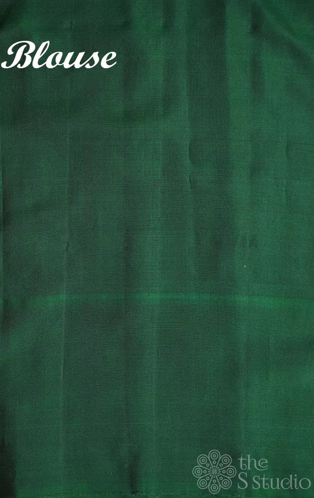 Light pink gadwal silk saree with dark green border