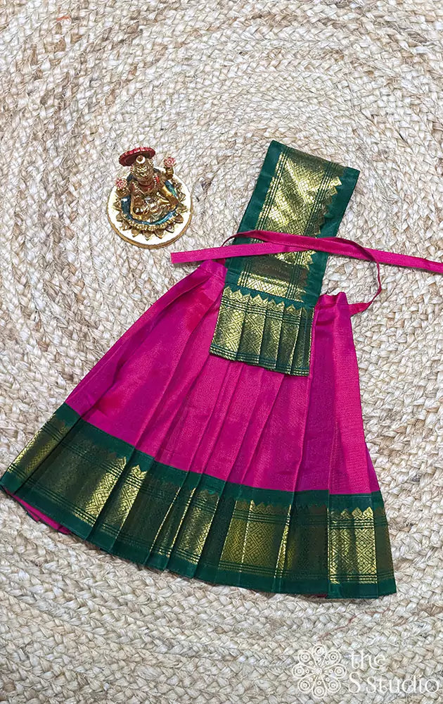 Rani pink with green big border Goddess vasthram