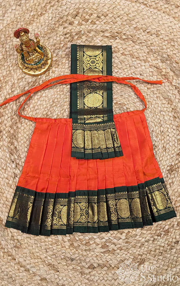 Orange with green getti zari border Goddess Vasthram