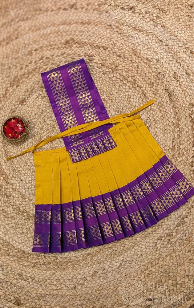 Yellow 10 Inch goddess vasthram with purple rettaipet border