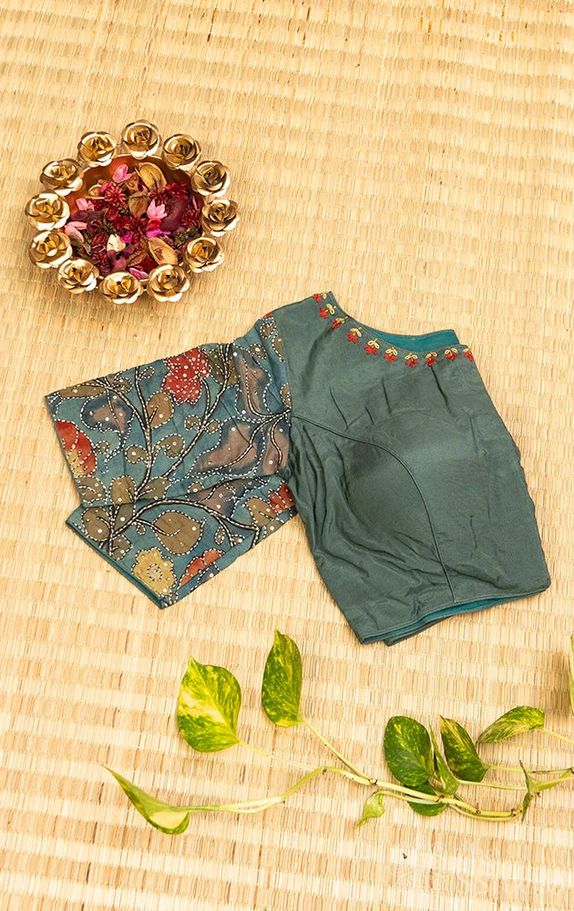 Pastel green embroidered silk blouse with kalamkari hand painted sleeves