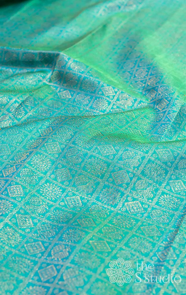 Sea blue kanchi silk blouse material with mayil chakaram motifs
