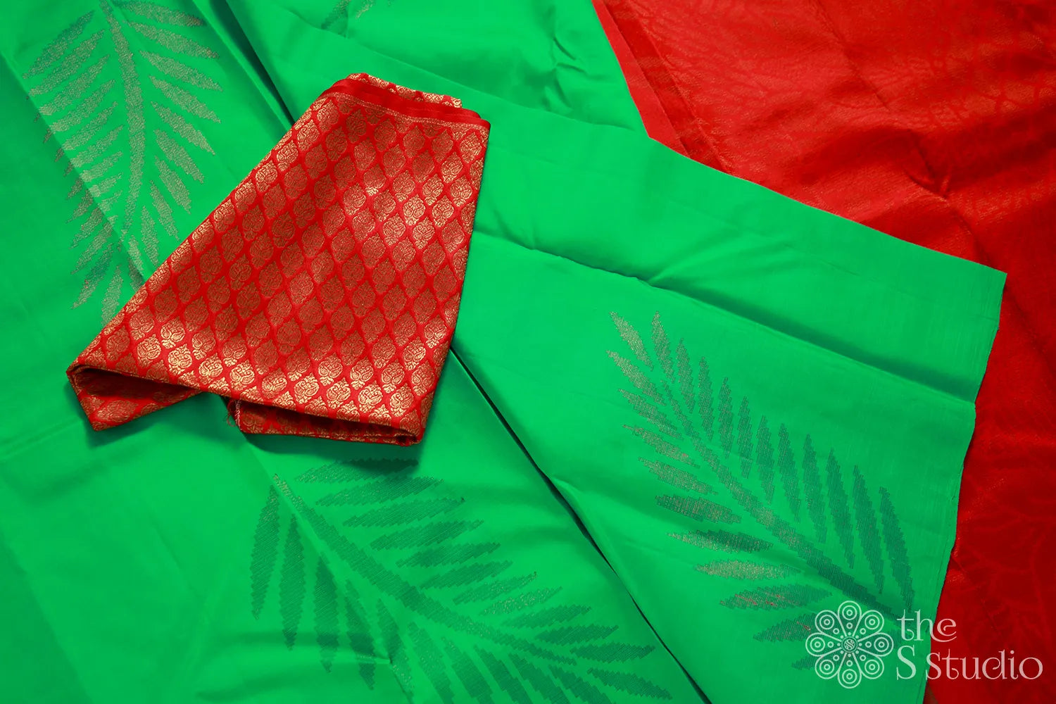 Green Kanchipuram Saree with Red Pallu
