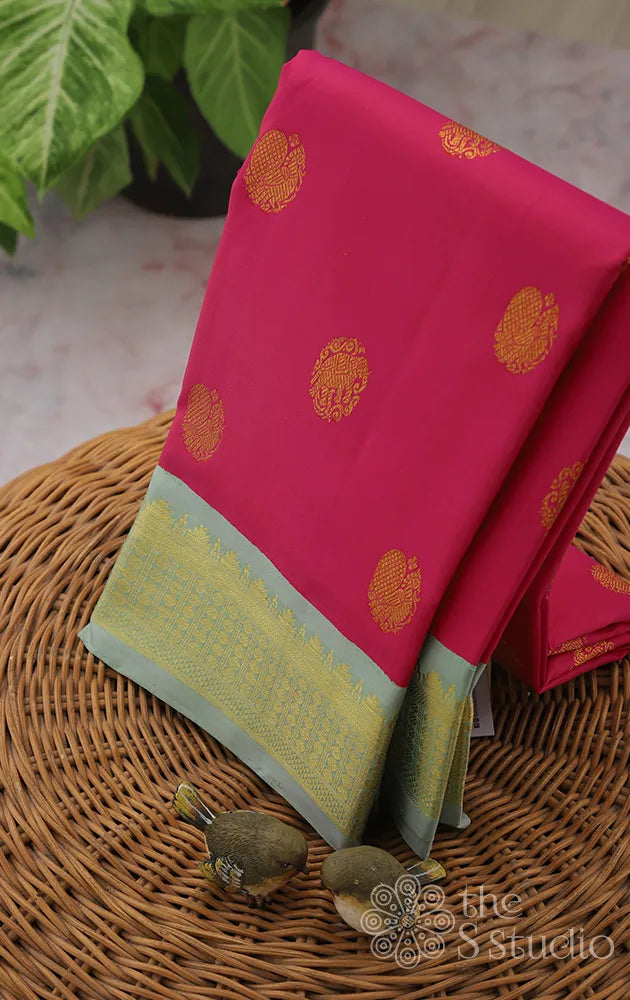 Reddish rose Kanchipuram saree with contrast border