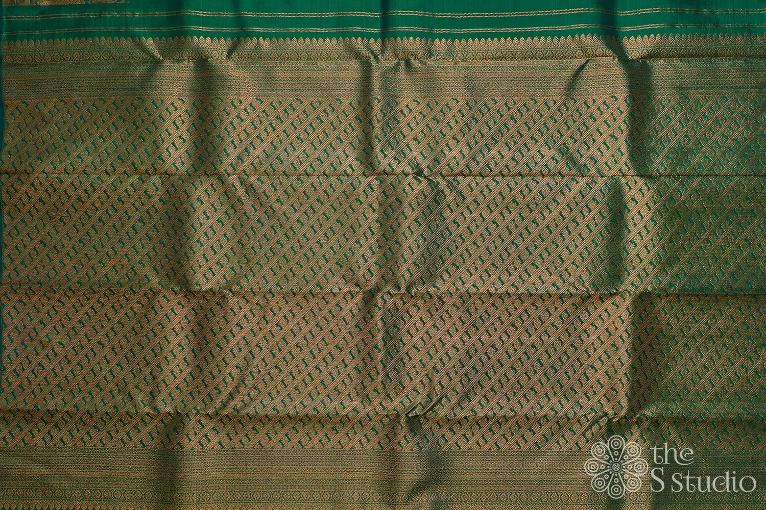 Green kanchipuram saree with antique zari border