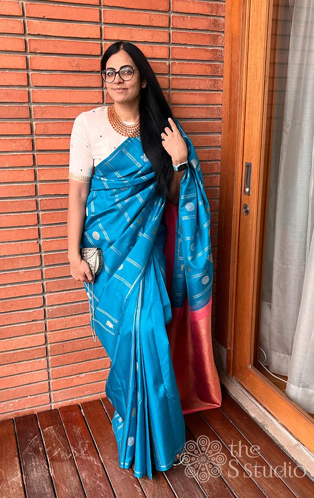 Blue kanchipuram silk saree with gold and silver buttas