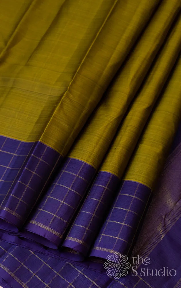 Methi green kanchipuram silk saree with violet border