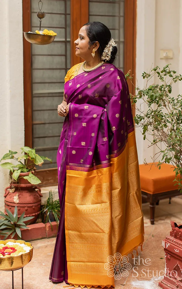 Magenta kanchipuram silk saree with buttas
