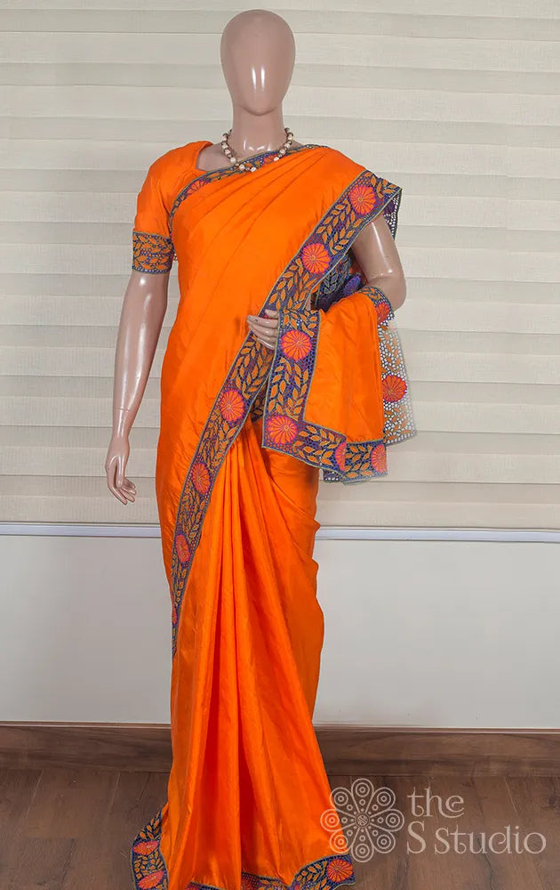 Orange kanchipuram cutwork saree