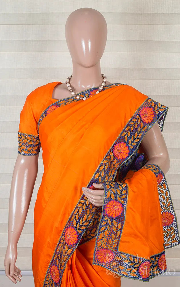 Orange kanchipuram cutwork saree