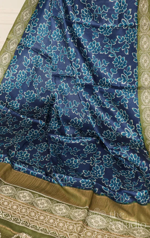 Blue tussar printed saree with embroidered border