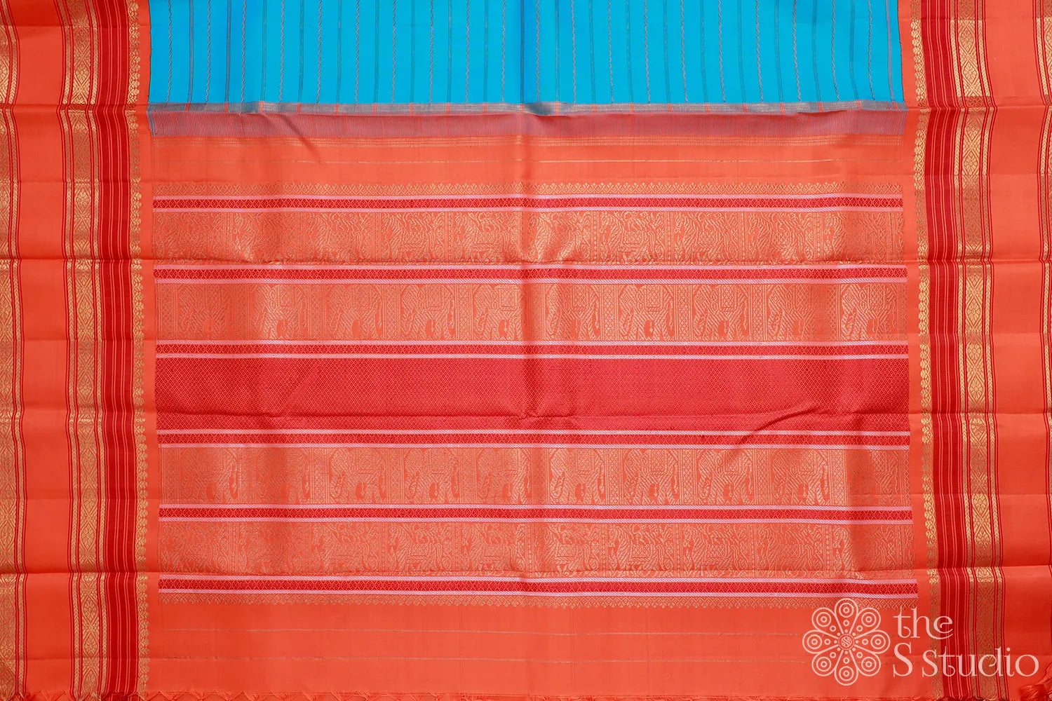 Light blue veldhari lines kanjivaram saree with orange border