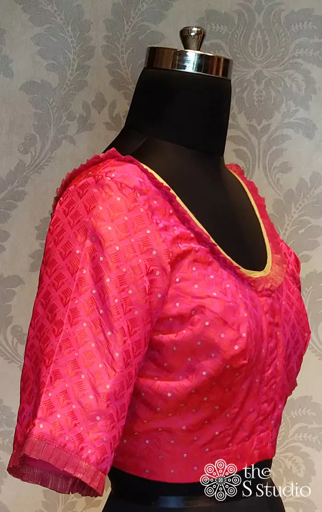 Pink silk readymade blouse with golden polka designs and pleated neck design