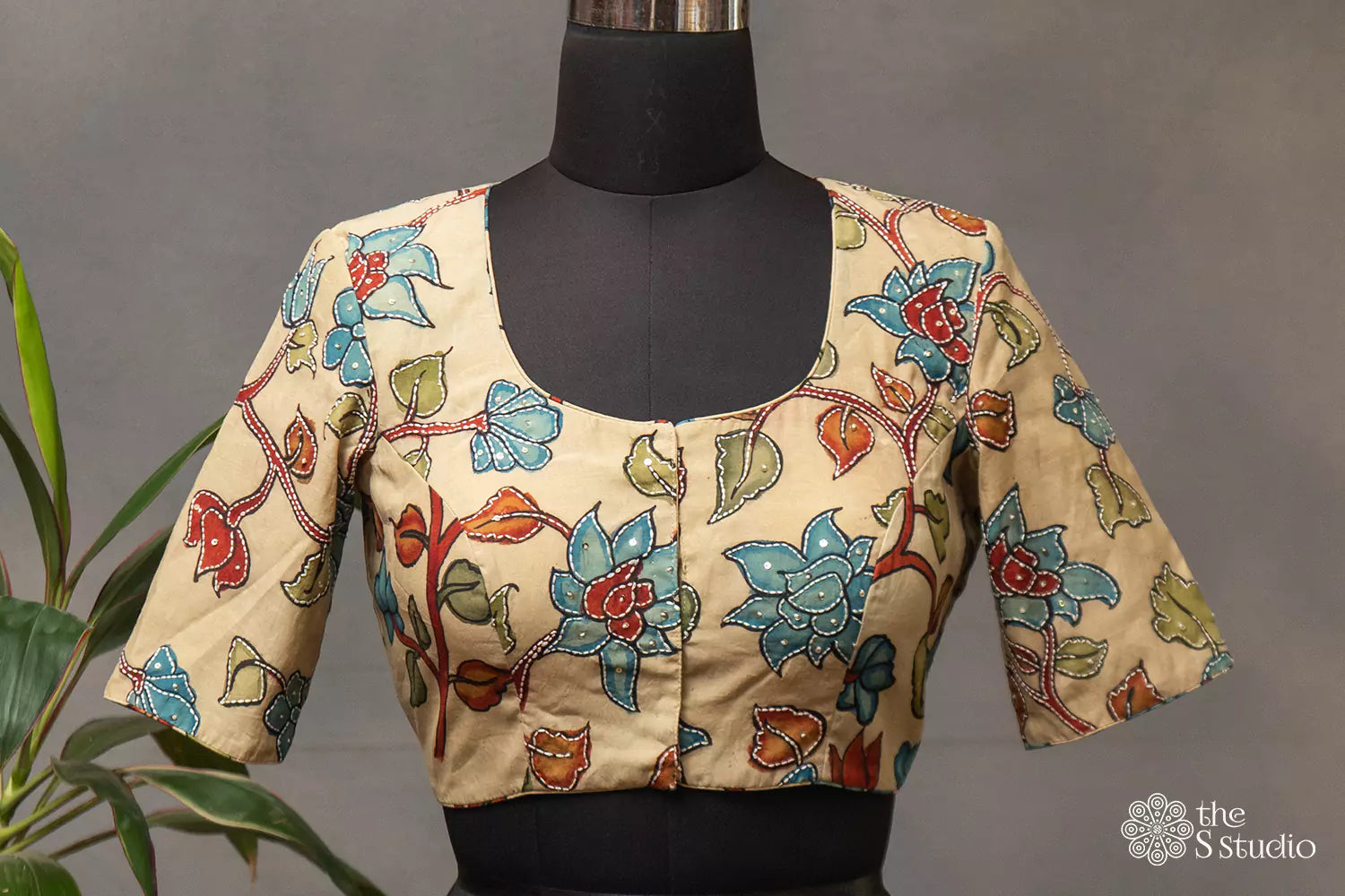 Off white and blue hand painted kalamkari silk blouse with embroidery