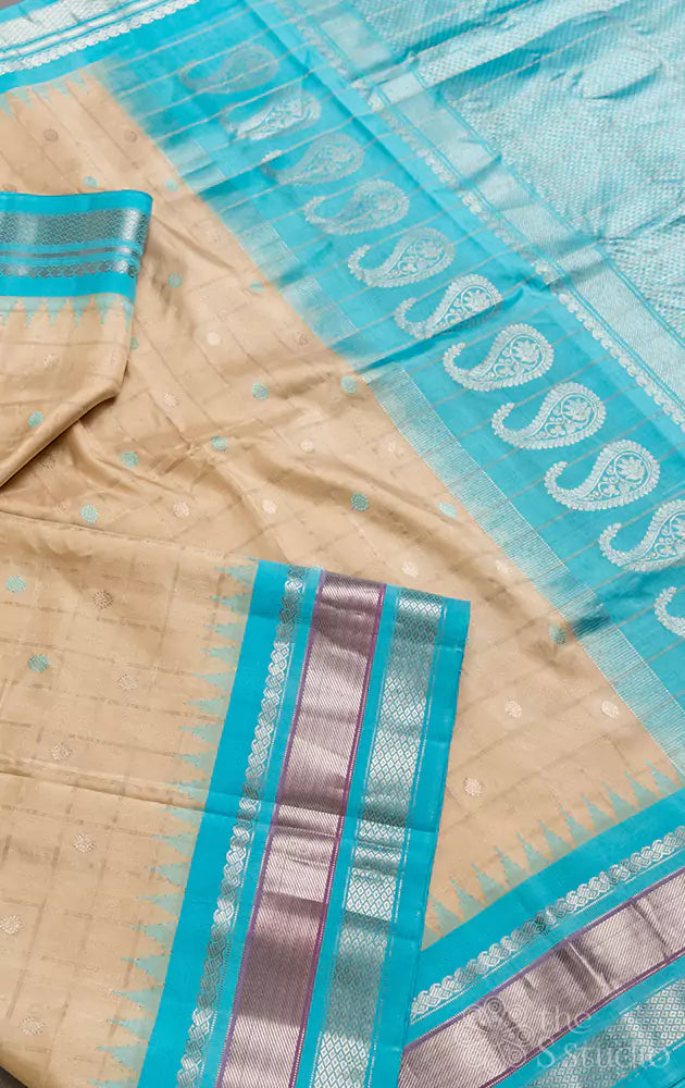 Beige zari checked handloom gadwal silk saree with light blue border