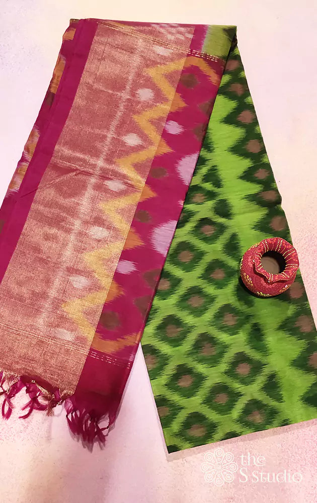 Parrot green ikat kora silk cotton saree with rani pink pallu