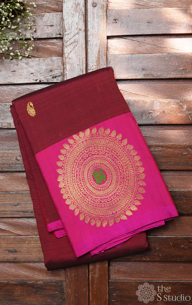 Brown kanchi silk saree with ranipink border and woven zari motifs