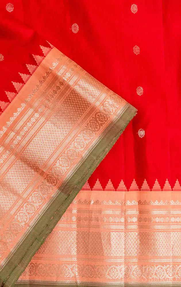 Red pure gadwal silk saree with peach silver zari border