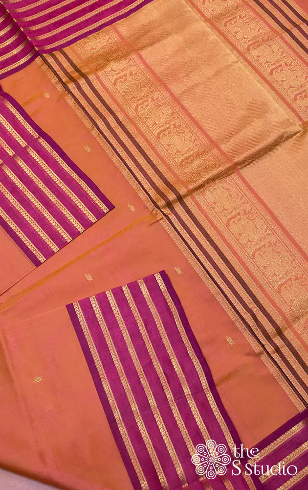 Peach silk cotton saree with violet zari border