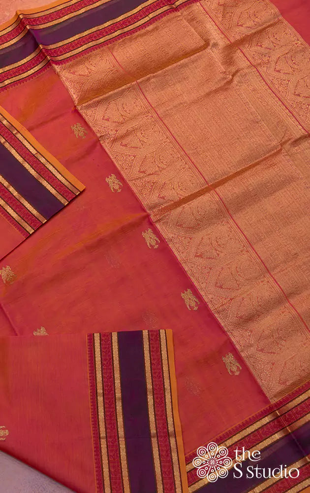 Orange silk cotton saree with contrast zari border